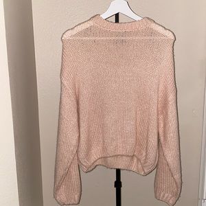 Light pink knitted sweater